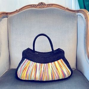 Striped raffia purse with black trim